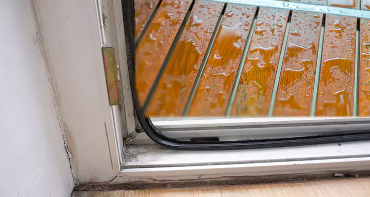 Water Leaking Wooden Patio Doors Repair in Wright, FL